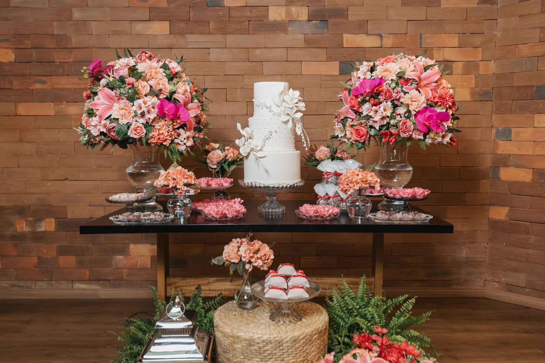 Wedding cake table with florals